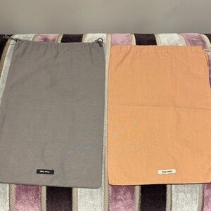 Miu Miu Drawstring Dust Bag Duo in Gray and Peach